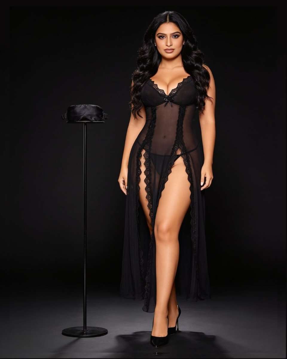 A woman models a black sheer lingerie set with lace trim and a long matching robe against a dark studio background. A black garment stand is positioned to her left.